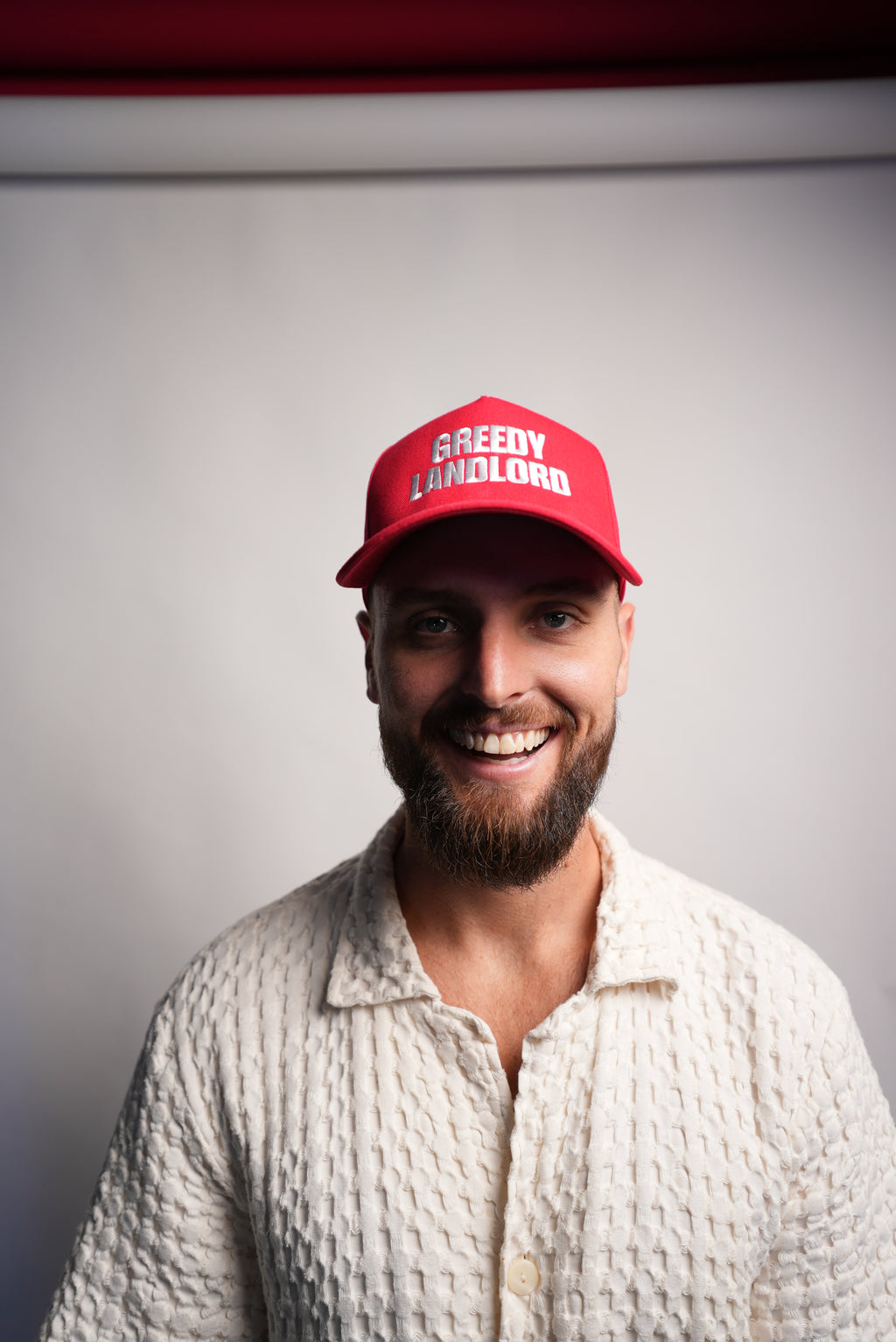 Greedy Landlord Cap
